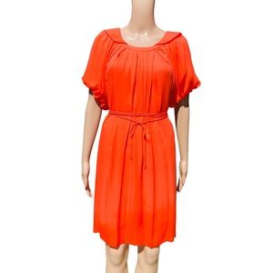 Bright orange w/ a hint of coral blousy dress so don’t let the size detour you